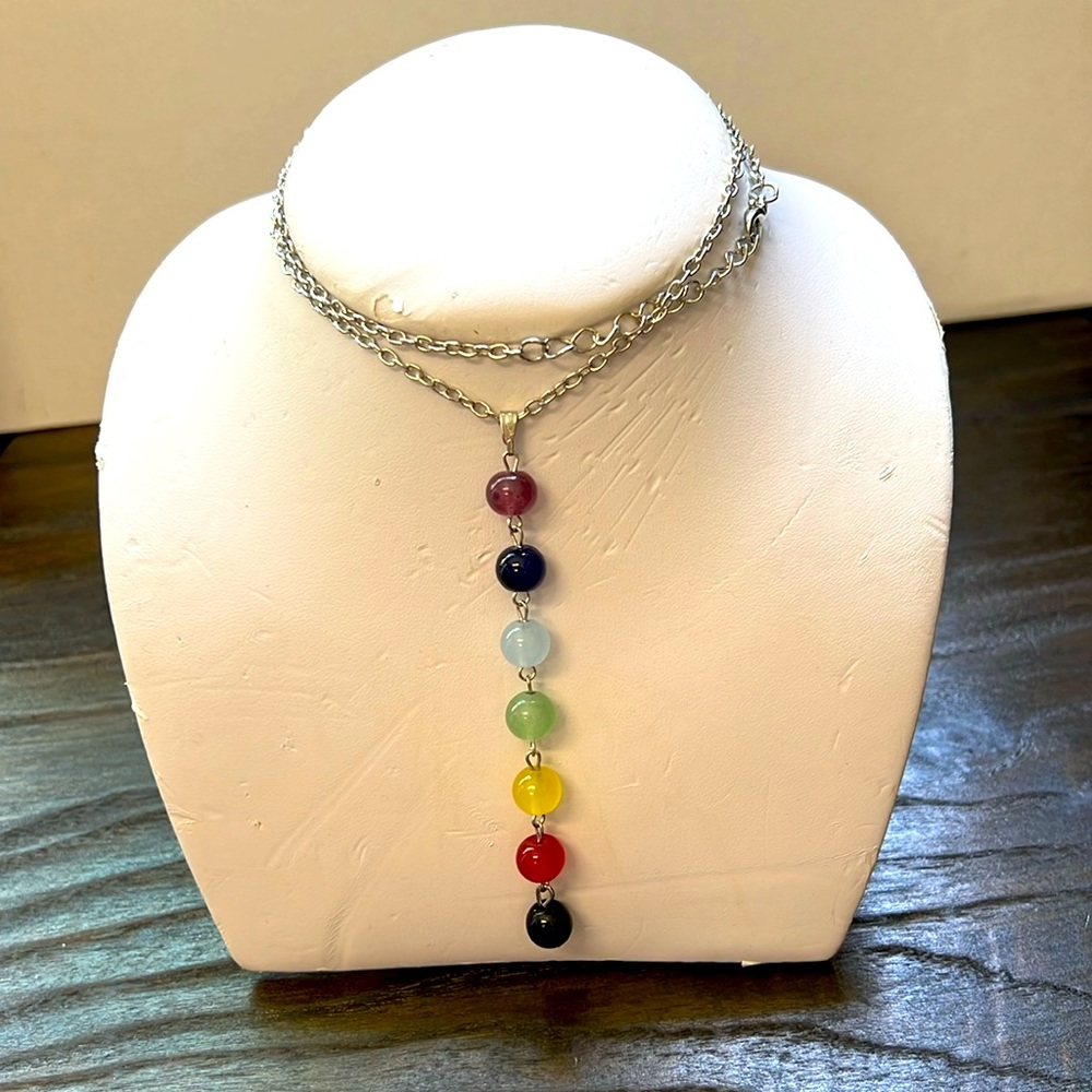 New with tag 20” link chain with 7 shakras stones,chain is 20” long very elegant